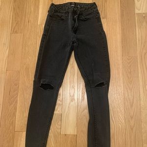 Just Black skinny black jeans with knee rips. Size 26. Perfect condition!